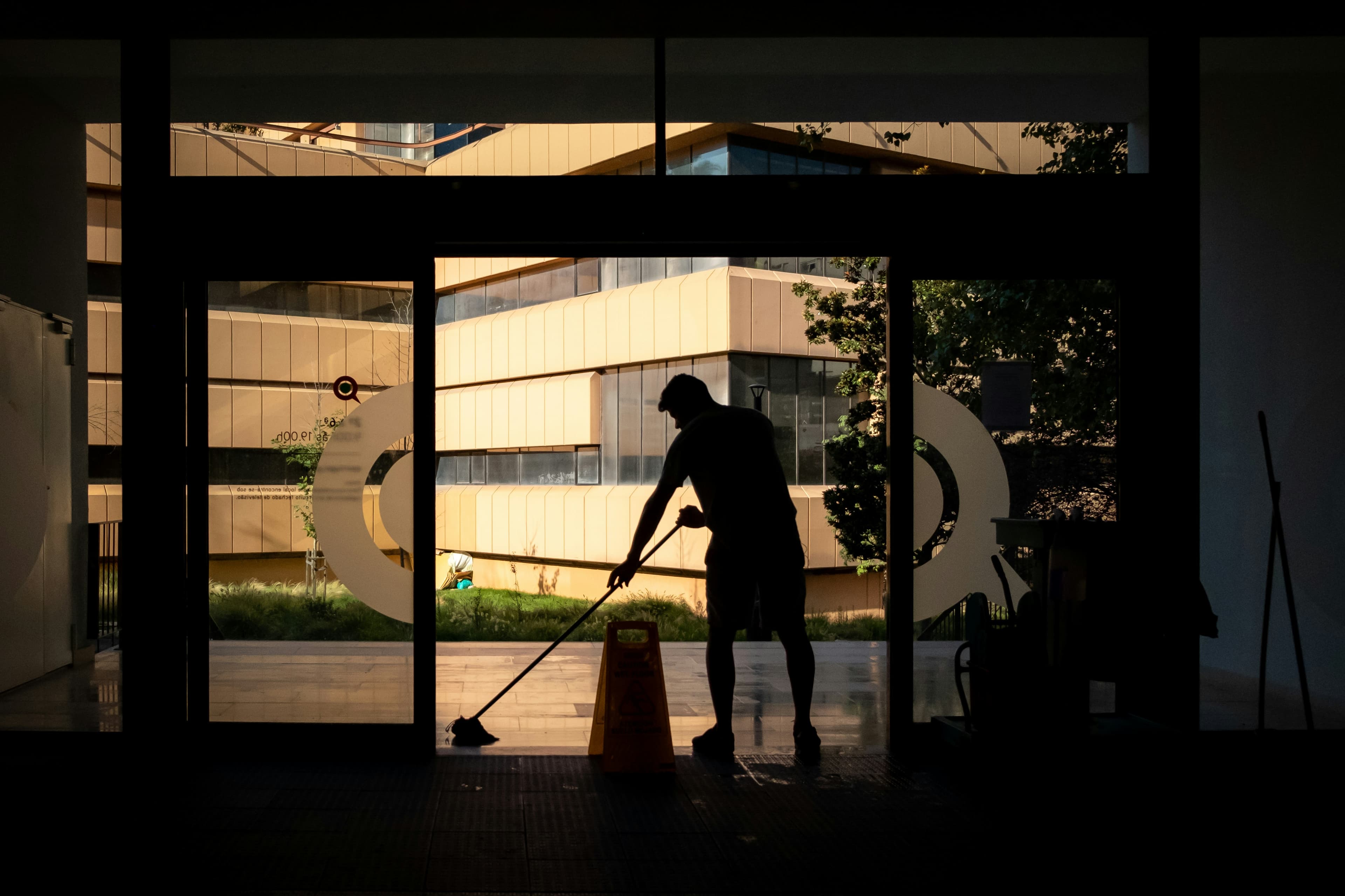 Facility staff maintaining a modern workplace